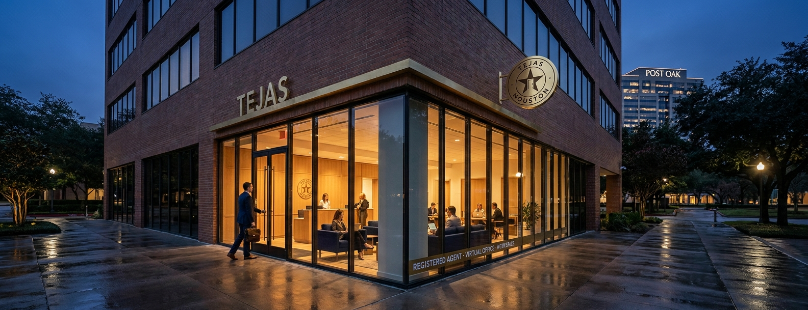 The corner storefront glowing at dusk, Tejas sign over the glass
